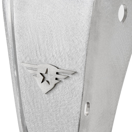 Close-up view of a raw aluminum rear fender flare for a Jeep Wrangler, showcasing the natural metal finish and the removable, paintable Combat Off Road logo near the edge. The image also highlights pre-drilled holes for easy installation, emphasizing durability and customization for off-road use.