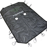 Black mesh sunshade for a 4-door Jeep JK, designed to reduce sunlight exposure while maintaining airflow. Features the Combat Off Road logo prominently displayed in white with a subtle green backing at the center. The sunshade has two cutouts for the front seat area and is equipped with durable bungee cords along the edges for secure attachment to the Jeep's roll bars. The shade's material is lightweight and sturdy, suitable for off-road adventures.