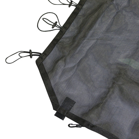 Close-up of the edge of a black mesh sunshade for a 4-door Jeep JK. The durable fabric is bordered with reinforced stitching for added strength. Bungee cords with hooks are attached along the edge, providing a secure and adjustable method for fastening the sunshade to the vehicle's roll bars. The design ensures a snug fit and stability during off-road use.